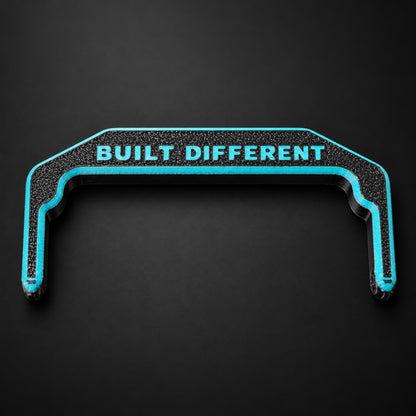 Apache 1800 Built Different handle in black with turquoise accents.