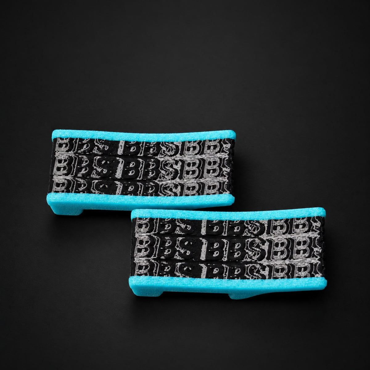 Front view of Apache 1800 kit latches with repeating BBS pattern and turquoise accents.